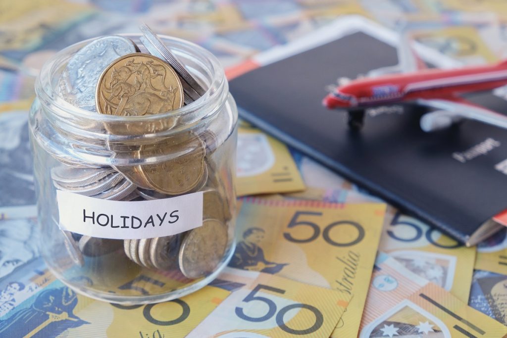 australian-money-in-holidays-jar-with-passport